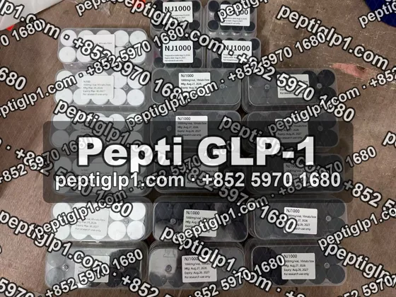 Pepti shipment photo, batch 1: lyophilized vial kits packed for courier collection, recipient details blurred