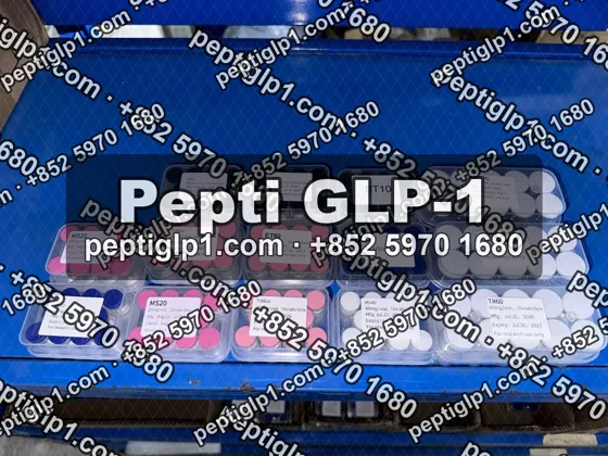 Pepti shipment photo, batch 1: lyophilized vial kits packed for courier collection, recipient details blurred