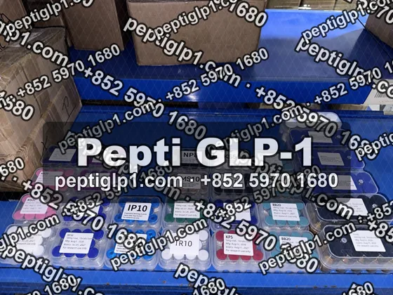 Pepti shipment photo, batch 1: lyophilized vial kits packed for courier collection, recipient details blurred