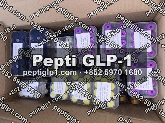 Pepti shipment photo, batch 2: lyophilized vial kits packed for courier collection, recipient details blurred
