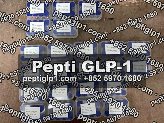 Pepti shipment photo, batch 2: lyophilized vial kits packed for courier collection, recipient details blurred