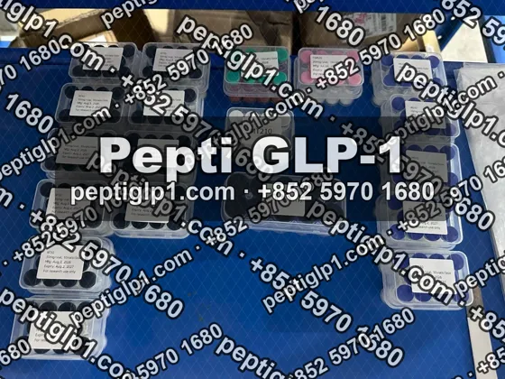 Pepti shipment photo, batch 3: lyophilized vial kits packed for courier collection, recipient details blurred