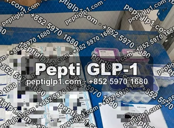 Pepti shipment photo, batch 3: lyophilized vial kits packed for courier collection, recipient details blurred